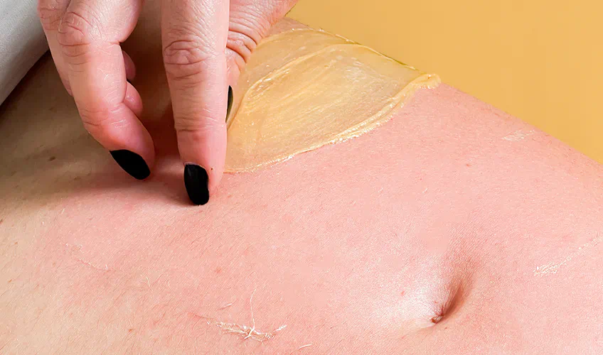 How to remove leftover body wax from the skin after waxing?